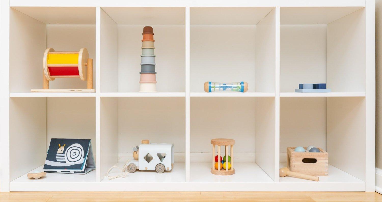 Open shelves with Montessori-inspired learning materials